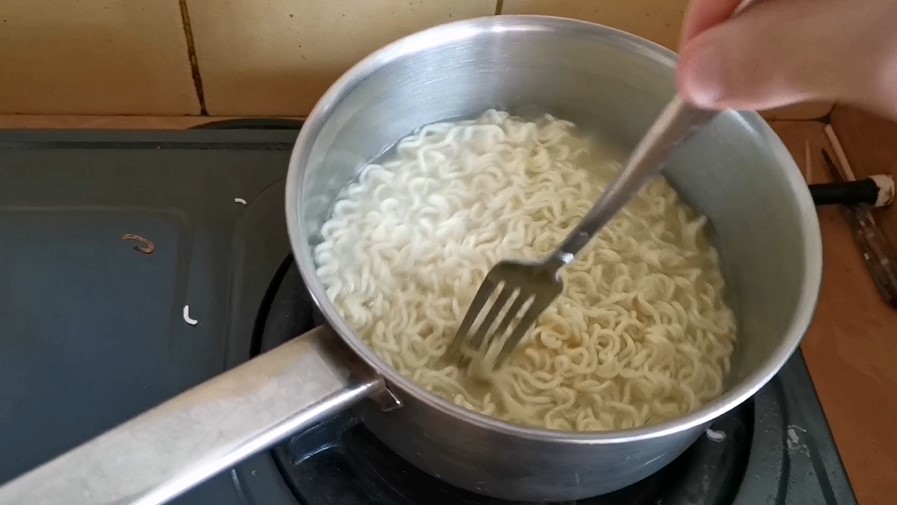 Cooking Noodle Stir with Fork Free Stock Video