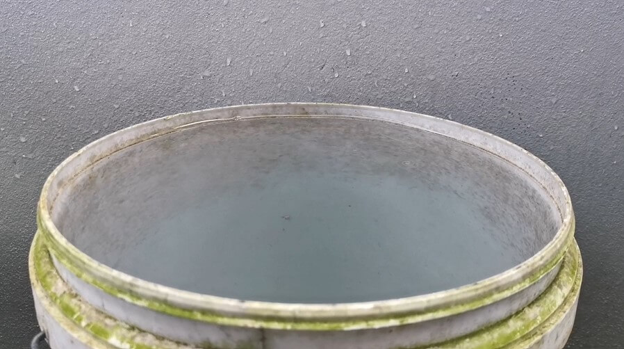 Rain water drop in pail free stock video